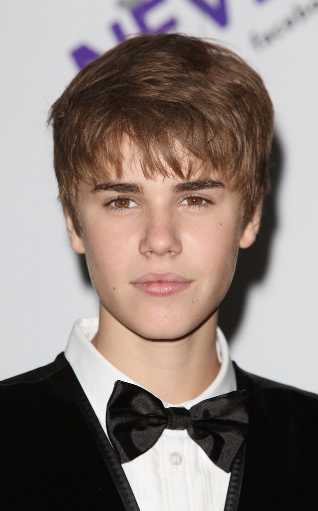 Justin Beiber poses for photo while attending Justin Beiber: Never Say Never ...