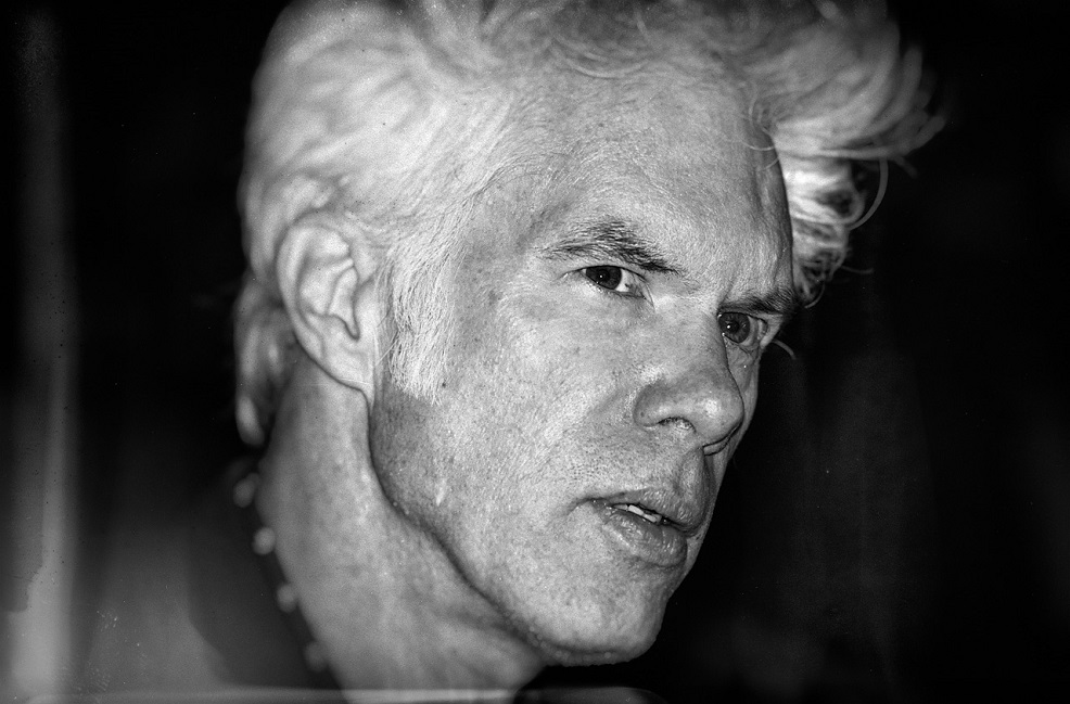 a picture of director jim jarmusch looking pensive