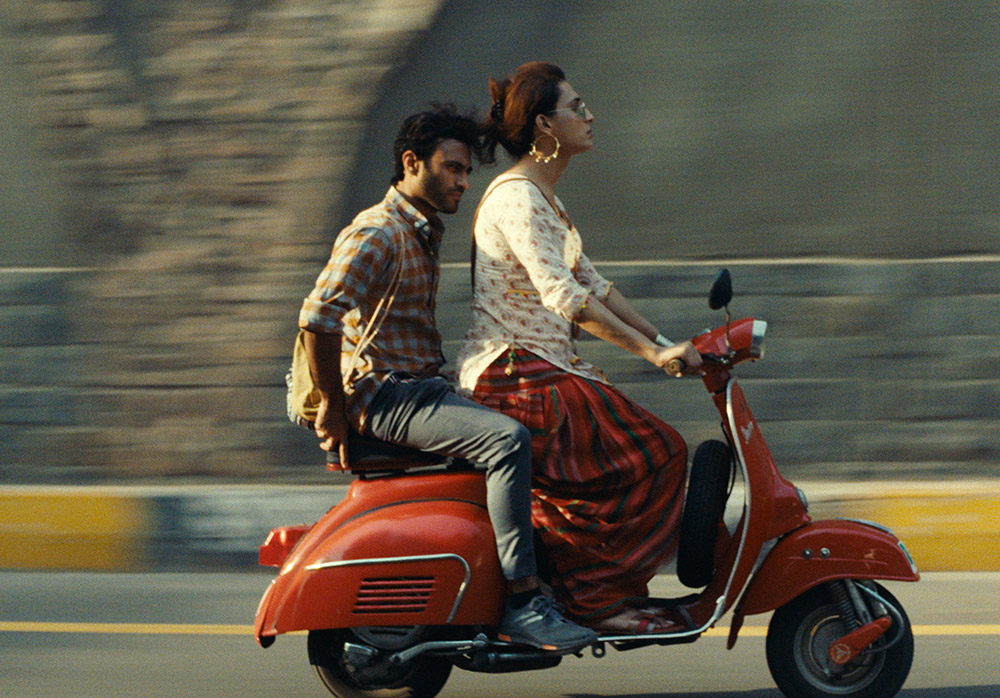 A couple on a moped