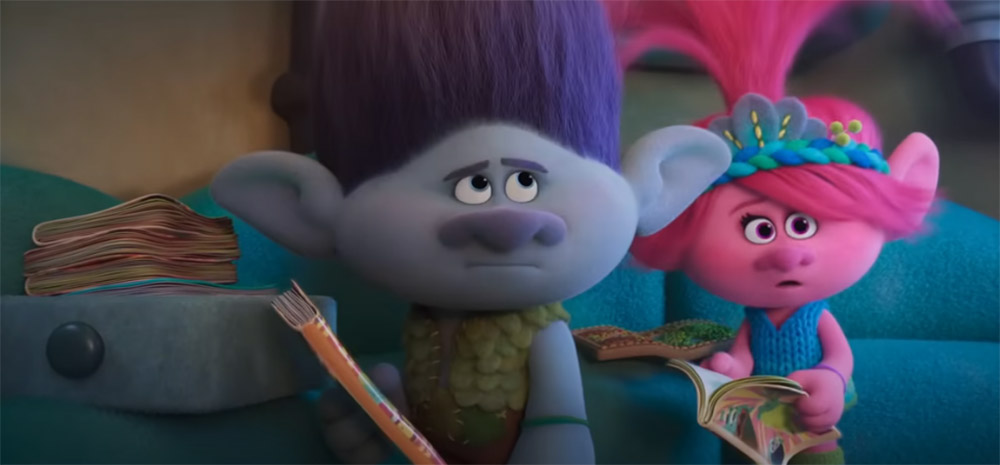 Male and female cute trolls looking less than pleased