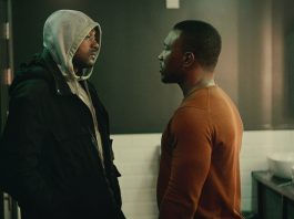Man in a hoodie facing up to another man - Top Boy S3
